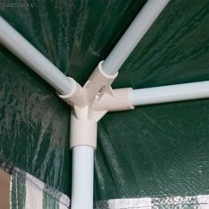 an overhead view of a green and white umbrella