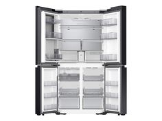 an open refrigerator freezer with both doors wide open and no ice maker on the inside