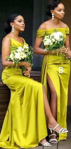 two women in yellow dresses standing next to each other