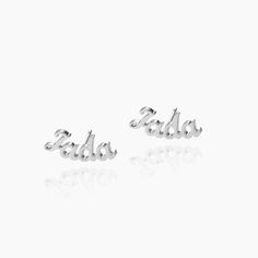 Custom Name Studs Earrings Make a statement with our Custom Name Studs Earrings. These earrings can be personalized with your name, the name of a loved one, or a special word, making them a unique and meaningful accessory. Crafted from high-quality 18K gold and silver plating, these earrings are not only stylish but also durable, ensuring they will last for years to come. Each earring features a delicate stud design, perfect for everyday wear or for adding a touch of elegance to any outfit. The Arabic Jewelry, Stud Design, Jewelry Charms Pendants, Bangle Ring, Photo Necklace, Special Words, Studs Earrings, Make Your Mark, Silver Earrings Studs