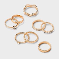 8-piece band ring set from Wild Fable™ includes a variety of designs that range from a simple band to textured to stone studded and more. Made with gold-tone metal. Perfect for everyday wear or special occasions. Wild Fable™: A look for every story. If you're not satisfied with any Target Owned Brand item, return it within one year with a receipt for an exchange or a refund. Good Rings, Women Money, Simple Band, Grown Women, Stone Studs, Rings Cool, Wild Fable, Gold Tone Metal, Band Ring