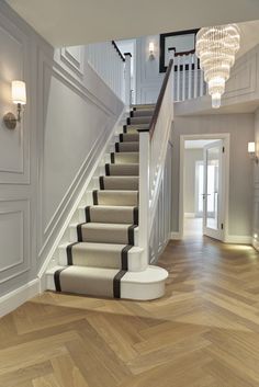 the stairs in this house are white and black