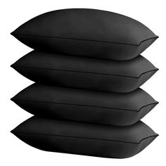 four black pillows stacked on top of each other