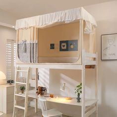 a bunk bed with a desk underneath it