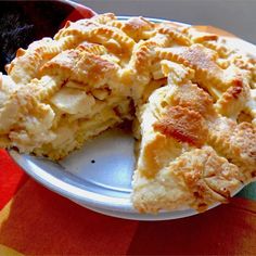 a pie on a plate with one slice missing