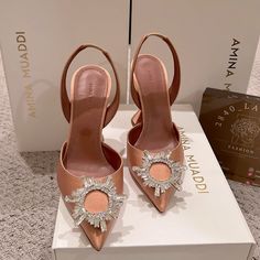 Super Hard To Find Amina Muaddi Begum Slingback In Chestnut. Fits True To Size. Please See My Previous Transaction History For Ratings And Reviews. You Can Also Visit My Insta @2840_lamode. Amina Muaddi Slingback, Elegant Brown Slingback Pumps For Party, Luxury Brown Slingback Pumps For Party, Chic Brown Heels For Wedding, Luxury Brown Slingback Pumps For Evening, Luxury Beige Slingback Pumps For Party, Designer Slingback Pumps For Wedding, Brown High Heel Wedding Shoes, Brown High Heel Wedding Heels