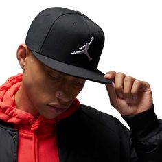 Your style leaps above contenders with this Jordan Brand Pro hat. It features the iconic Jumpman in raised embroidery for a 3D-like effect. This solid snapback is easy to adjust for the ideal fit. Black Snapback Flat Cap For Sports Events, Black Snapback Flat Cap For Sports, Black Flat Cap Fitted Hat For Sports, Sporty Flat Cap Fitted Hat For Sports, Black Fitted Flat Cap For Sports, Black Flat Cap Trucker Hat For Baseball Season, Urban Snapback Hat For Baseball Season, Black Trucker Hat Flat Cap For Baseball Season, Baseball Season Snapback Hat With Flat Brim