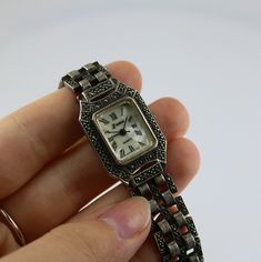 This is Vintage Rama Elegant Square Links Marcasite Stones Japan Quartz Movement Watch Stainless Steel Back Condition: Vintage Metal: 925 Sterling Silver Weight: 39.9 grams Length: 7.5 in Length case: 1 in Width case: 0.8 in Width bracelet: 0.5 in Images you see are actual pictures of jewelry you will receive Every purchase comes thoughtfully packaged and ships within 1 business day New York State buyer will be charged sales tax Feel free to contact us with any questions. We are open Mon-Fri 9-5 Silver Watch As A Gift, Silver Watches Suitable For Gifts, Antique Silver Watch With Rectangular Dial, Antique Silver Watches With Rectangular Dial, Watch Movement, Quartz Movement, Vintage Metal, Wrist Watch, Jewelry Watches