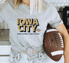 Iowa City Shirt, Iowa City Wave Shirt, Iowa Wave Shirt, Fall Graphic Tee, Game Day Shirt, Football Shirt, Iowa Wave Tradition by NationalParkFam on Etsy Fall Graphic Tee, Fall Graphic, Shirt Football, Iowa City, Room Couch, Game Day Shirts, Childrens Hospital, Football Shirt, Unisex Shorts