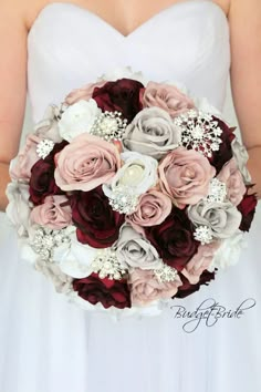 a bridal holding a bouquet of flowers