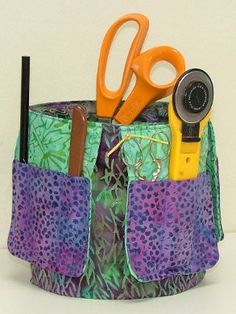 the pocket canister pattern is designed to be used as a holder for scissors and other crafting supplies