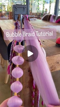 Kiverse Face Painting on Instagram: "Bubble Braid Tutorial 💜 @kiversefacepainting   #bubblebraids #bubblebraidtutorial #bubblebraidponytail #bubblebraid #hairtutorial #reusablebraids #hairtiebraids #ᴋɪᴅsʙʀᴀɪᴅs #kiversefacepainting #tutorials #tutorialsbraidshair #kidshairideas #bubblehair #hairbobbles #hairbobble" Bubble Braid With Synthetic Hair, Bubble Braids Extensions, Rave Hair Bubble Braids, Diy Fairy Hair Tutorials, Bubble Braid Hair Extensions, Fake Hair Bubble Braids, Bubble Braids With Fake Hair, Braiding Hair With Yarn, How To Do Bubble Braids With Extensions