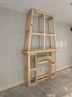 an unfinished room with a shelf made out of wood