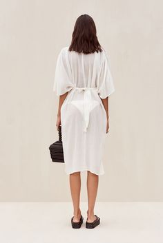 INGA COVERUP - OFF WHITE – CULT GAIA Bohemian V-neck Tie Waist Cover-up, Beachwear Wrap Cover-up With Tie Waist, Summer V-neck Cover-up With Drawstring, Spring Linen V-neck Kaftan, Chic V-neck Festival Cover-up, Elegant Open Front Summer Cover-up, Linen Beachwear Cover-up For Spring, V-neck Beach Dress With Tie Waist As Beach Cover-up, Elegant Beach Kimono With Tie Waist