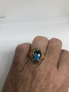 Huge great color blue topaz stone setting is handcrafted in gold finished 925 sterling silver Size 6 Can be sized, my jeweler charges $10-$20 Please ask for a quote? All rings are shipped free in the US in a nice gift box. Check out our over a THOUSAND great reviews Engraving is $4 per letter and is not always perfect depending on the piece. It can take a few days if the jeweler is busy. This is payable to Paypal Judithsltd@gmail.com Blue Topaz Stone, Vintage Gothic, Jade Ring, Stone Setting, Topaz Stone, Blue Band, Stone Settings, 925 Sterling Silver Ring, Sterling Silver Ring