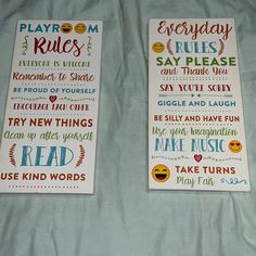 there are two signs on the bed that say playroom rules and they have emoticions