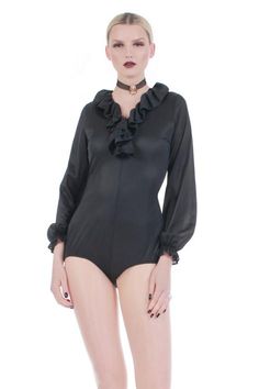 70s Vtg Ruffled Bodysuit Semi Sheer Black Nylon Loungewear Long Sleeve – KCO VINTAGE Stretch Ruffled V-neck Bodysuit, Fitted Ruffles Bodysuit For Night Out, Stretch Ruffled Bodysuit For Party, Stretch V-neck Bodysuit With Ruffles, Stretch Ruffles Bodysuit For Party, Stretch Ruffle Bodysuit For Party, Elegant Stretch Bodysuit With Ruffles, Stretch Bodysuit With Ruffles, Stretch Black Bodysuit With Ruffles