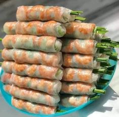 several rolls are stacked on top of each other and ready to be wrapped in plastic wrappers