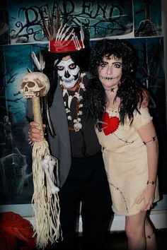 two people dressed up in costumes for halloween