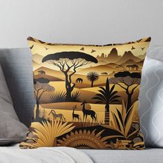 an african landscape with animals and trees on the horizon, in gold tones throw pillow