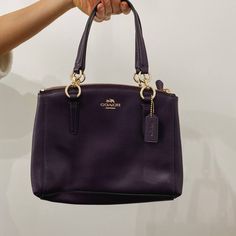 Coach Purple Leather Shoulder Crossbody Brand New Without Tags. Features A Gorgeous Deep Plum Purple Color, Gold Details And Hardware, Short Handle And Long Adjustable Crossbody Details. Measures Approximately 10" Wide And Just Shy Of 8" Tall (Not Including Straps) 5082 Elegant Purple Shoulder Bag With Detachable Strap, Coach Purple Evening Bag, Coach Purple Shoulder Bag For Evening, Elegant Purple Bag With Zipper Closure, Elegant Purple Bags With Zipper Closure, Elegant Purple Shoulder Bag With Zipper, Elegant Purple Bags With Gold-tone Hardware, Formal Purple Shoulder Bag With Branded Hardware, Chic Purple Bags With Branded Hardware