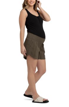 A wide smocked waistband adds stretchy comfort to these versatile, casual-chic maternity shorts. 4" inseam 60% viscose, 40% linen Hand wash, dry flat Imported Casual Maternity Bottoms For Summer, Casual Summer Maternity Bottoms, Bump Friendly Maternity Bottoms For Summer, Short Stretch Bottoms With Smocked Back, Linen Maternity, Chic Maternity, Maternity Chic, Maternity Shorts, Casual Chic