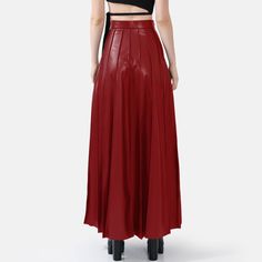 Step into effortless elegance with the Solace Vegan Leather Pleated Maxi Skirt in striking red. With a hidden zip closure and stylish golden embellishments, this skirt combines sophistication with a touch of luxury. The lightweight fabric drapes beautifully, offering a relaxed yet structured fit with just the right amount of stretch for comfort and durability. The vertical hand-pleating creates a flattering silhouette by elongating the lower body. Perfect for stylish occasions where comfort is k Chic Red Long Pleated Skirt, Long Red Flowy Pleated Skirt, Red Pleated Flowy Maxi Skirt, Hand Pleating, Red Pleated A-line Maxi Skirt, Pink Non-stretch Pleated Maxi Skirt, Pleated Maxi Skirt, Pleated Maxi, Draped Fabric