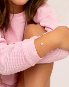 Treat your little one to a touch of whimsy and elegance with our polished dog paw bracelet. Crafted from sterling silver, this adorable piece is perfect for young girls who adore animals. Whether it's for a birthday, holiday, or just because, this bracelet adds a charming accent to any outfit. Shop now and make her smile brighter than ever!

#KidsJewelry #SterlingSilver #DogPawBracelet #ChildrensFashion #AnimalLovers #InSeasonJewelry Dog Paw Bracelet, Paw Bracelet, Jewelry Gift Guide, Baby Necklace, Teen Jewelry, Baby Earrings