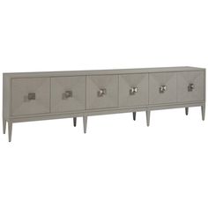 an image of a sideboard with four doors and three drawers on the bottom shelf