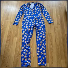 Never Worn. Adorable Cookie Design Onesie. Very Comfy And Soft. Snap In Closures Opening So You Won’t Have To Remove The Whole Onesie When Using The Restroom. Material- 10% Spandex 90% Polyester. Size Large. Price Is Firm Onesie Women, Cookie Designs, Sleepwear Women, Women's Intimates, The Whole, Onesies, Pajamas, Spandex, Women Shopping