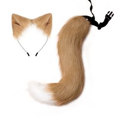 an animal head with long hair attached to it's side and a fox tail