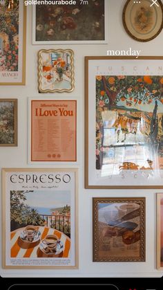 there are many pictures on the wall and one has a clock above it that says, i love you espresso