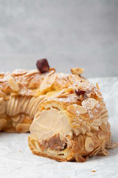 an easy to follow paris - brest pastry with almonds and powdered sugar