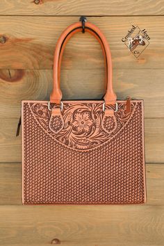 Genuine leather tote with full floral carving on the front and sides. Kimes Ranch Jeans, Kimes Ranch, Western Purses, Western Boutique, Corral Boots, Genuine Leather Totes, Brown Leather Totes, Western Look, Purse Patterns