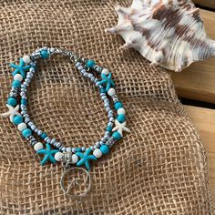 “Bahia Honda” Stars Anklet With Wave Charm White & Turquoise Colored Stars With Double Bracelets (They Are Attached)Silver Seed Beads And Adjustable Silver Clamp Star Anklet, White Turquoise, Colour Star, Turquoise Color, Blue And Silver, Anklets, Seed Beads, Jewelry Crafts, Beaded Jewelry