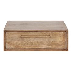 a wooden box sitting on top of a white wall next to a drawer with handles