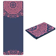 a blue and pink yoga mat with an intricate design on the side, next to a matching towel