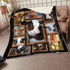 a blanket that has pictures of cows on it