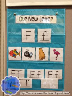 a blue bulletin board with letters and pictures on it that say, our new letter