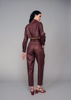 Introduce both a new color and texture to your wardrobe with the IRA LYSA Merlot Linen Pants. Reach for these Chocolate or Burgundy color linen pants when completing your next sleek look. Tired of wearing black all the time? Spice it up with an earth tone and a high-waisted easy silhouette. Go from the office to an evening stroll with ease in these pants. The styling options are endless and the color flattering. * Pegged pants* High rise with belt and loops* Pockets* Deep pleats on the front* Cr Brown Linen Tapered Leg Pants, Brown High Waist Linen Bottoms, High Waist Brown Linen Bottoms, Brown Linen Bottoms For Work, Brown Linen Workwear Bottoms, Fitted Linen Bottoms For Fall, Brown Linen Pants For Work, Brown Linen Pants For Workwear, High Waist Linen Pants For Fall