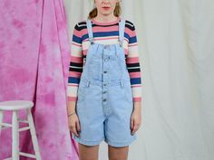 "AUNT GERTRUDE PRESENTS - vintage 90's blue denim overalls - brand: Joy - 5 pockets - materials: 100% cotton CONDITION (1-10 ❶❷❸❹❺❻❼❽❾ Great vintage condition. SIZE/MEASUREMENTS size from label: L bust: open waist: 34 inches (86 cm) hips: 45 inches (114 cm) The model is 5'9\" (174 cm), measures 35-27-38 (90-69-96 cm) and wears size M" Vintage Medium Wash Shortalls For Spring, Vintage Denim Shortalls For Summer, Retro Denim Shortalls For Summer, Vintage Medium Wash Overalls For Summer, 90s Style Denim Shortalls, Retro Spring Shortalls Overalls, Retro Spring Shortalls, 90s Cotton Shortalls For Spring, 90s Style Denim Jumpsuit With Pockets