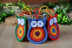 crochet owl ornaments in a basket on a table