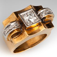 This fantastic circa 1940s ring is centered with one (1) old European cut diamond bead set into a square platinum topped 18K yellow gold setting. The shoulders of the ring are each accented with three (3) round single cut diamonds bead set into a platinum topped 18K yellow gold setting. The ring measures 13.4mm at the top, rises 8.9mm above the finger, tapering to 5.8mm wide and 1.1mm thick at the base of the shank. This ring is currently a size 6.25. Two of the small side accent diamonds are chipped, but nothing that is visible without a very close look. Vintage Formal Signet Ring With Diamond Accents, Vintage Signet Ring With Diamond Accents For Formal Events, Vintage Signet Ring With Diamond Accents For Formal Occasions, Vintage Diamond Signet Ring For Formal Occasions, Vintage Diamond Rings With Rectangular Shape, Vintage Rectangular Rings With Brilliant Cut, Vintage Rectangular Brilliant Cut Rings, Vintage Signet Ring With Single Cut Diamonds, Retro Diamond Ring For Formal Occasions