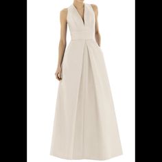 A V-Neckline Highlights The Structured Bodice Of A Rich Dupioni Gown That Flatters With A Wide Inset Waistband And A-Line Skirt Flared By Crisp Inverted Pleats. 60 1/2" Regular Length (Size 8); 64" Plus Length (Size 22w) Hidden Back-Zip Closure V-Neck Sleeveless, With Cutaway Shoulders On-Seam Pockets Full-Length, Inverted-Pleat A-Line Skirt Lined 100% Polyester Dry Clean Imported Special Occasion And Wedding Suite Item #5131550 New Chic V-neck Wedding Evening Dress, Chic Formal V-neck Gown, Formal V-neck Gown For Spring, Chic Formal Gown With V-neck, Chic V-neck Formal Gown, Chic Floor-length V-neck Wedding Dress, Chic Silk V-neck Wedding Dress, Chic V-neck Evening Dress For Wedding, Elegant White V-neck Gown