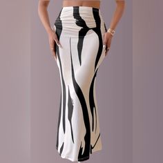 Zebra Print Maxi Skirt. Featuring A High Waist And Ruched Waistband, It Offers A Flattering And Comfortable Fit. Ideal For Any Occasion, Pair It With A Crop Top Or Blouse For A Chic, Stylish Look. Tulle Maxi Skirt, White Maxi Skirts, Print Maxi Skirt, Floral Pleated Skirt, High Waisted Maxi Skirt, Striped Maxi Skirts, Maxi Skirt Boho, Knit Maxi Skirt, Pleated Long Skirt