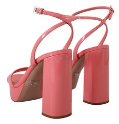 Step into luxury with these exquisite pink platform sandals by Prada. Crafted from top-quality patent leather, these sandals epitomize elegance with their sleek design and subtle logo details. Their expert Italian craftsmanship ensures not only a stunning aesthetic but also long-lasting wear. Feel the comfort of their leather bottom sole, perfect for a day out or a special evening event. These brand-new, tag-included heels are a must-have for those looking to add a touch of class to their wardro Pink Platform Sandals, Block Heel Platform Sandals, Pink Platforms, Ankle Strap Sandals Heels, Heels Platform, Platform Block Heels, Leather Platform Sandals, Chic Pink, Leather Block Heels