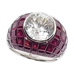 White Sapphire 5.81 carats with Ruby 14.38 carats Ring set in 18 Karat White Gold Settings Width: 1.2 cm Length: 1.2 cm Ring Size: 54 Total Weight: 12.02 grams "We first opened doors in 1980 when it was then situated in the vicinity of the Victory Monument; a small and modest storefront with a couple of counters. From its humble beginnings to where it stands today, our company has proven its abilities as a jeweler. Since the beginning, we have been supplying fine quality pieces to dealers, whole Antique Sapphire Rings, Ruby Ring Set, Sapphire Antique Ring, Cluster Ring Set, Sapphire Rings, Retro Ring, Diamond Ring Settings, Gold Ring Sets, Alternative Engagement Rings