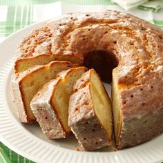 a bundt cake with slices cut out on a plate