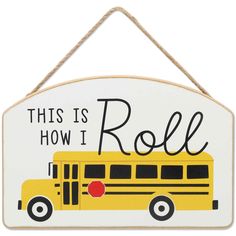 a sign that says, this is how i roll with a school bus on it