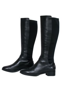 Every downtown darling needs a pair of riding boots in their closet for fall, so pick up these beauties from Tory Burch! This winter staple is elevated with a low block heel and stretch fabric back. Perfect for pairing with your favorite chunky sweaters and jeans, throw on your trench coat and be cold weather cute! Size 9 Leather front Stretch fabric back Rubber and leather outsole Tall boot Logo heel back Comes with box Toe to heel 10.75" Heel height 1.5" Shaft height 15.75" Circumference 14" Fitted Knee-high Riding Boots, Wide Calf Low Heel Knee-high Boots For Work, Wide Calf Knee-high Boots With Low Heel For Work, Fall Riding Knee-high Boots, Black Knee-high Riding Boots For Fall, Workwear Knee-high Boots With Low Heel Medium Width, Chunky Sweaters, Tall Boot, How To Stretch Boots